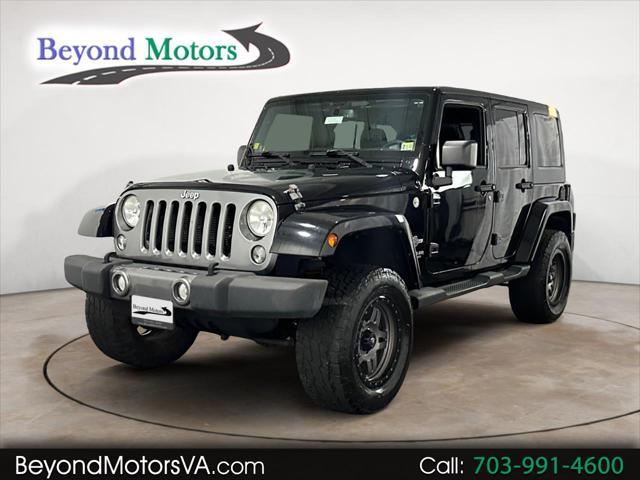 used 2014 Jeep Wrangler Unlimited car, priced at $18,500