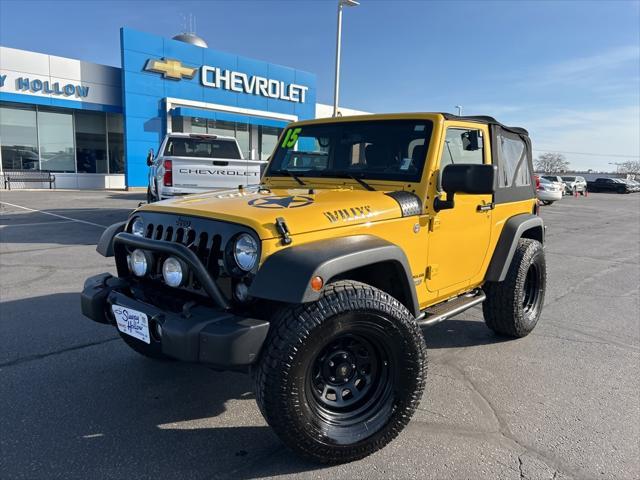 used 2015 Jeep Wrangler car, priced at $23,995