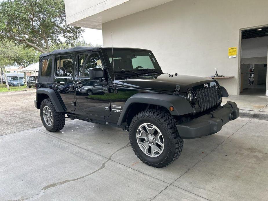 used 2015 Jeep Wrangler Unlimited car, priced at $16,629