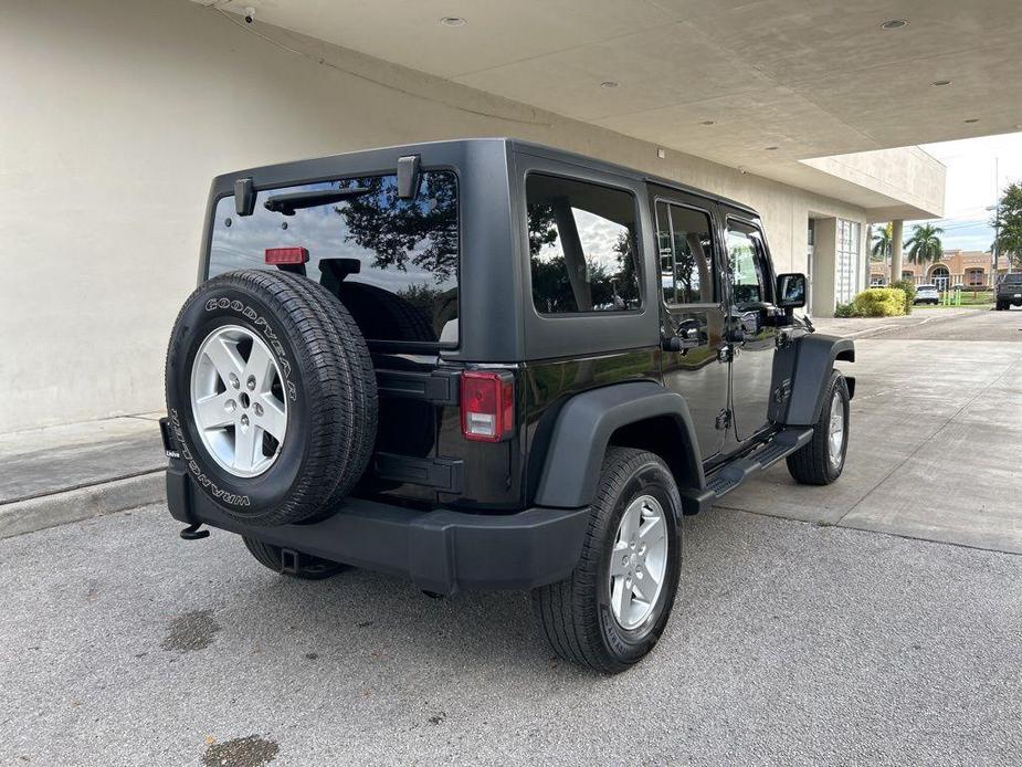 used 2015 Jeep Wrangler Unlimited car, priced at $18,299