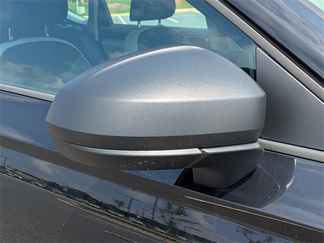 new 2025 Volkswagen Taos car, priced at $27,521