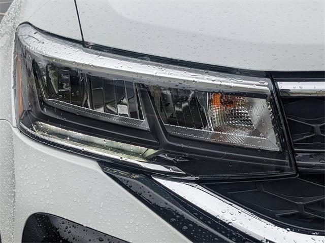 used 2024 Volkswagen Taos car, priced at $23,444