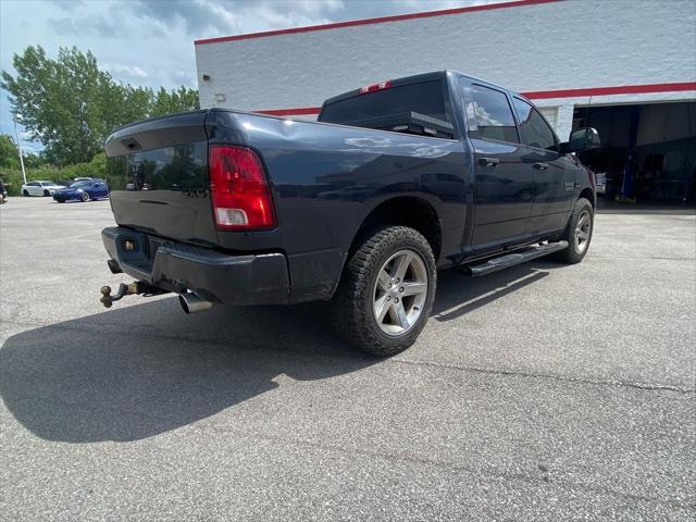 used 2014 Ram 1500 car, priced at $15,000