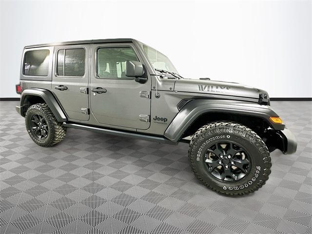 used 2021 Jeep Wrangler Unlimited car, priced at $29,896