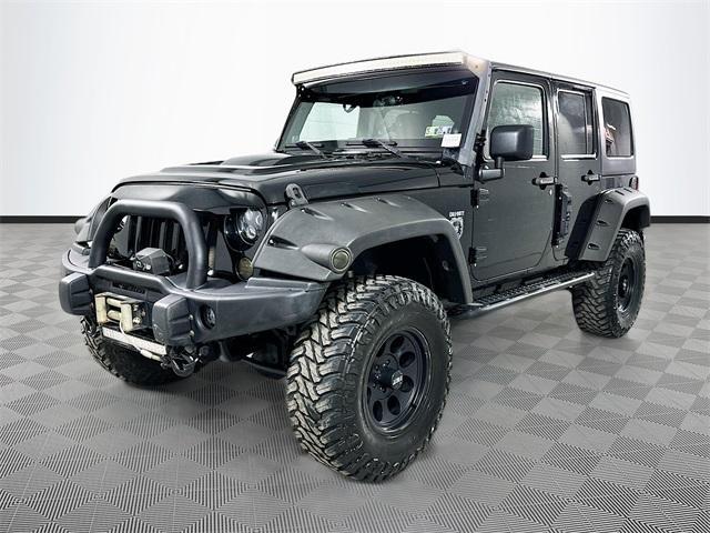 used 2011 Jeep Wrangler Unlimited car, priced at $18,954