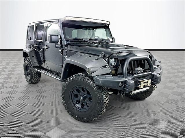 used 2011 Jeep Wrangler Unlimited car, priced at $18,954