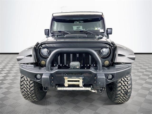 used 2011 Jeep Wrangler Unlimited car, priced at $18,954