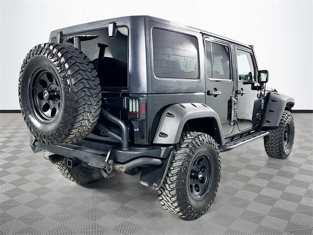 used 2011 Jeep Wrangler Unlimited car, priced at $18,954