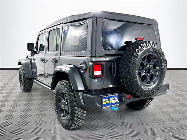 used 2023 Jeep Wrangler 4xe car, priced at $32,908