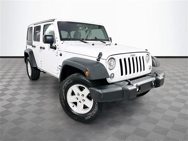 used 2017 Jeep Wrangler Unlimited car, priced at $21,856