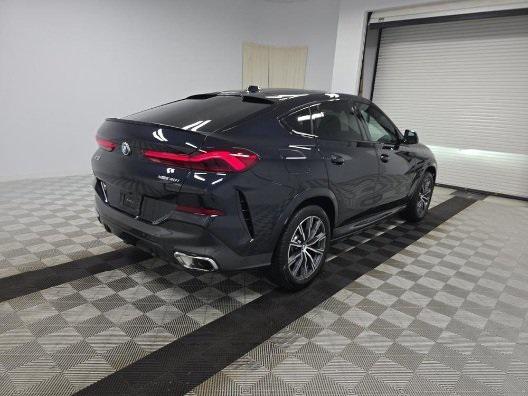 used 2025 BMW X6 car, priced at $78,990
