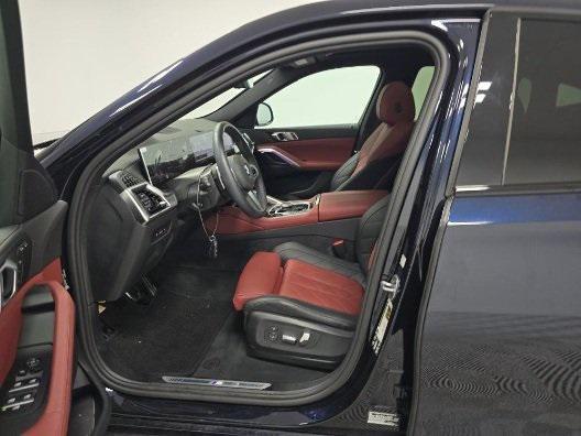 used 2025 BMW X6 car, priced at $78,990