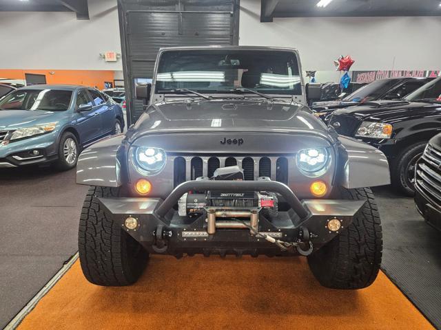 used 2016 Jeep Wrangler Unlimited car, priced at $21,995