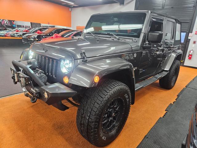 used 2016 Jeep Wrangler Unlimited car, priced at $21,995