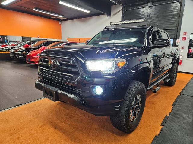 used 2018 Toyota Tacoma car, priced at $27,995