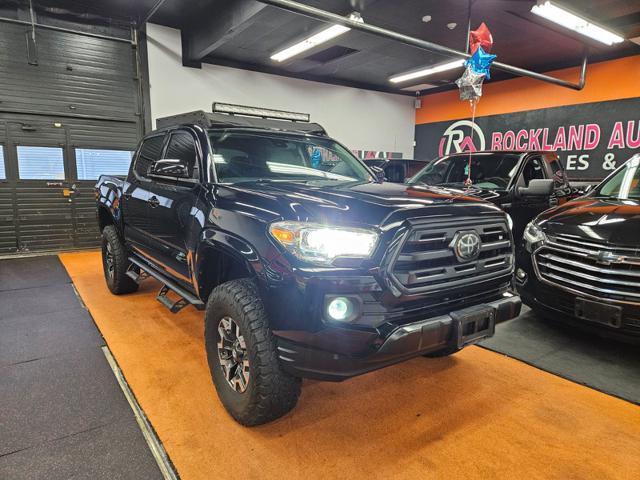 used 2018 Toyota Tacoma car, priced at $27,995