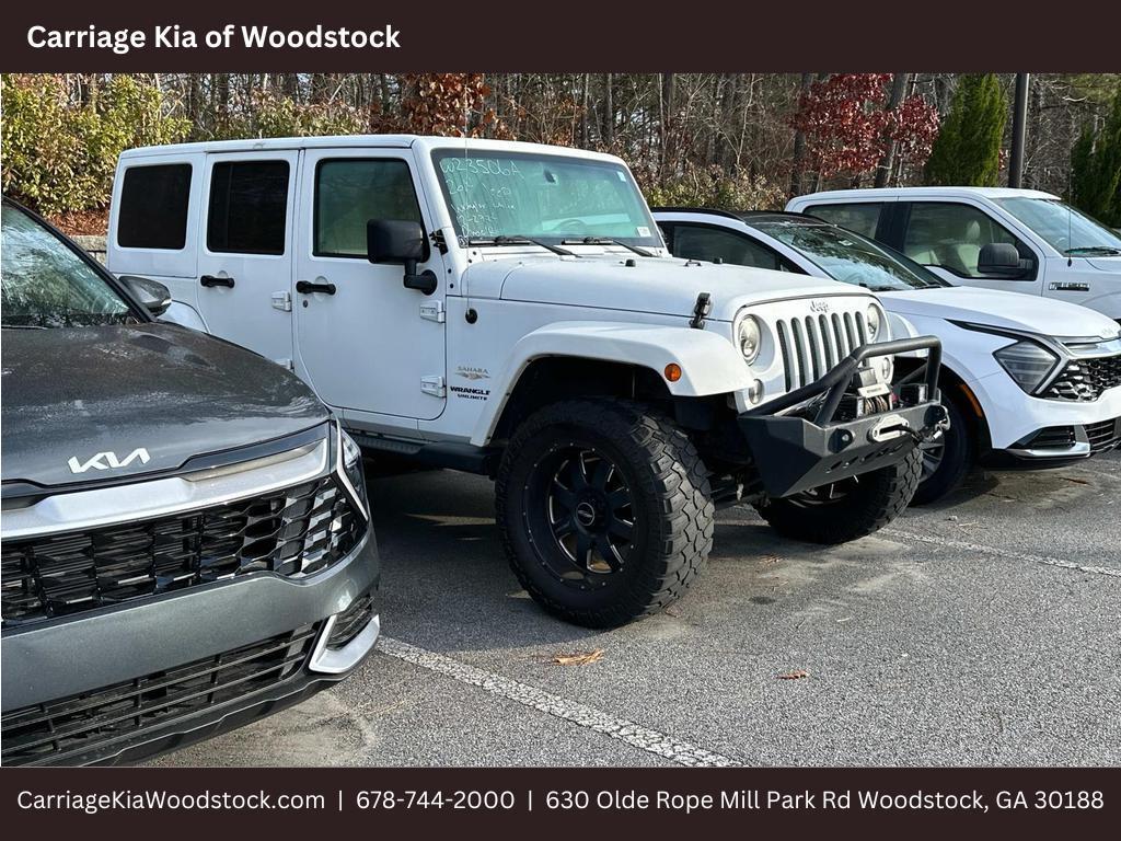 used 2014 Jeep Wrangler Unlimited car, priced at $18,522