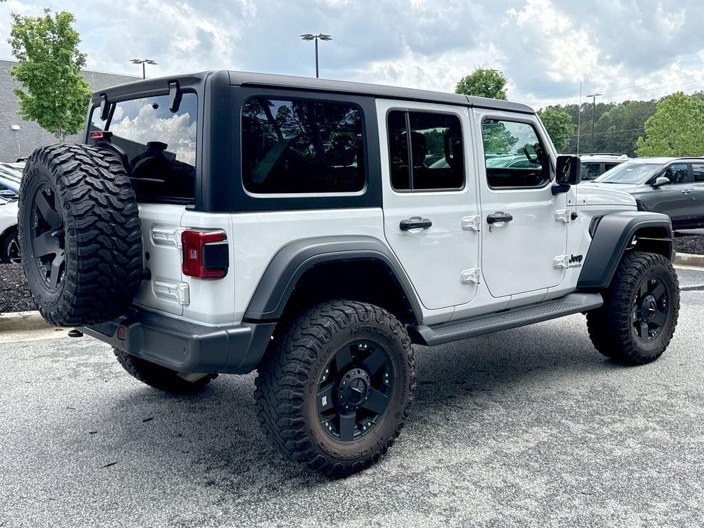 used 2021 Jeep Wrangler Unlimited car, priced at $31,526