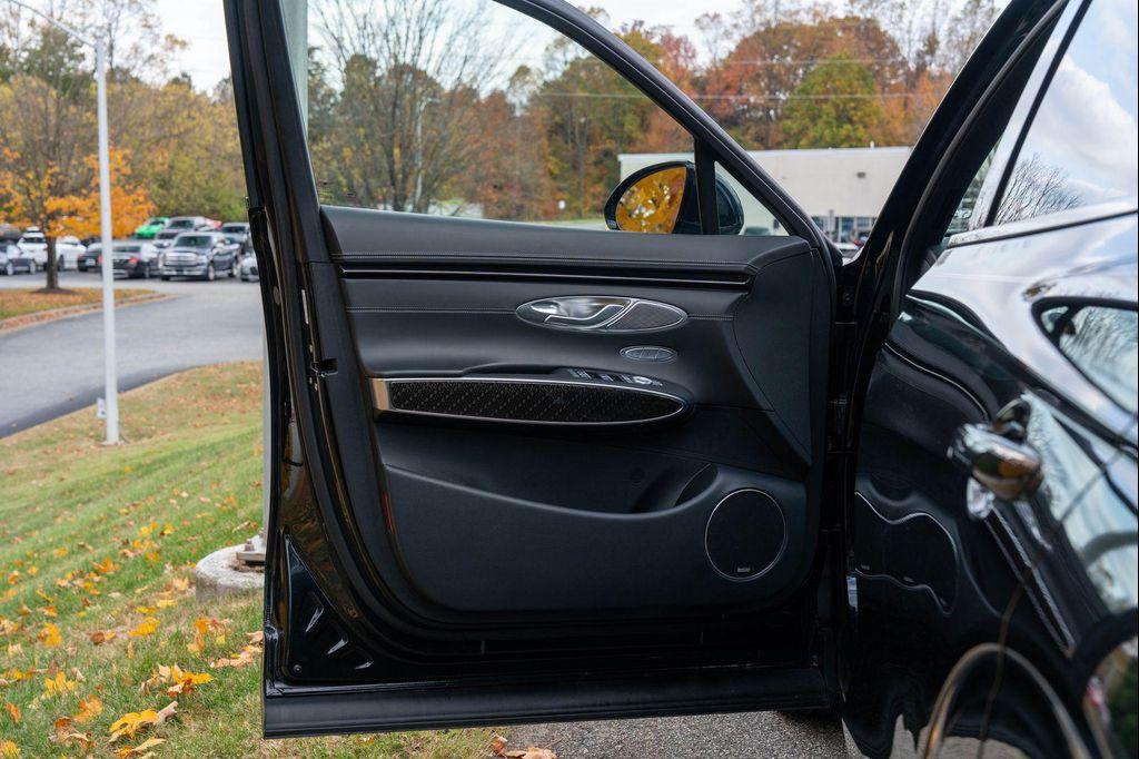 used 2023 Genesis GV70 car, priced at $42,853