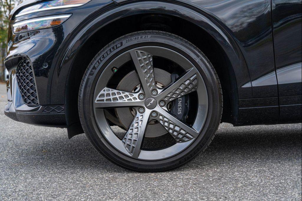 used 2023 Genesis GV70 car, priced at $42,853