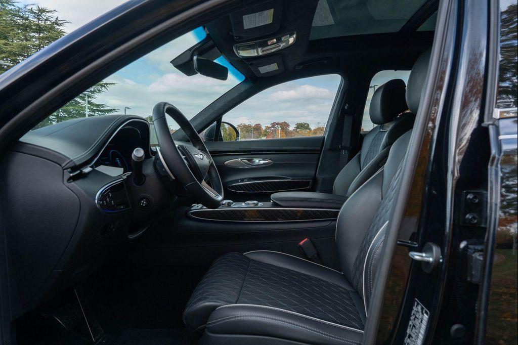 used 2023 Genesis GV70 car, priced at $42,853