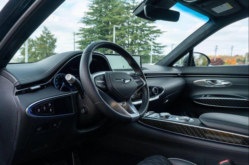 used 2023 Genesis GV70 car, priced at $42,853