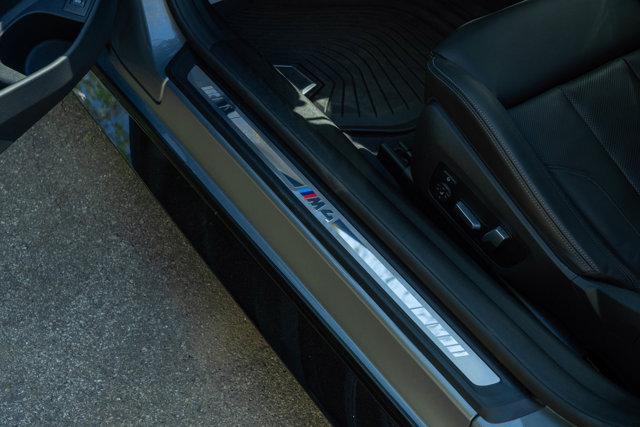 used 2024 BMW M4 car, priced at $77,890