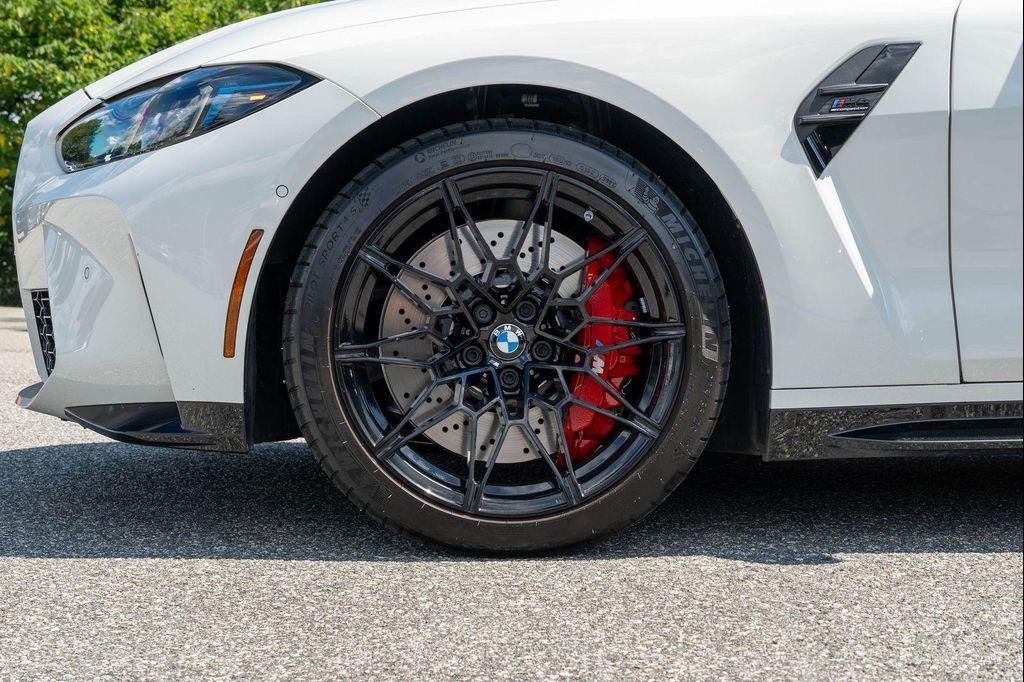 used 2025 BMW M4 car, priced at $91,957