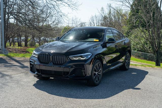 used 2022 BMW X6 car, priced at $57,900
