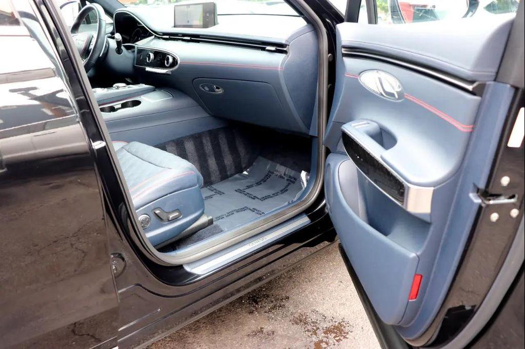 used 2023 Genesis GV70 car, priced at $44,995