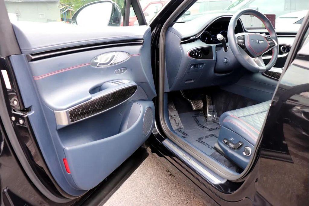 used 2023 Genesis GV70 car, priced at $44,995