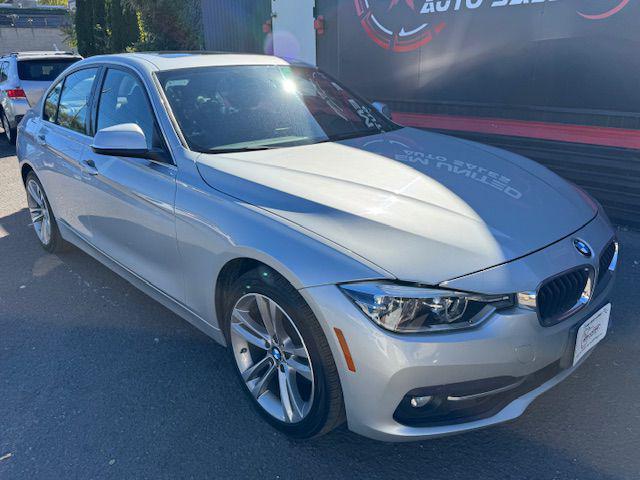 used 2018 BMW 330 car, priced at $19,995