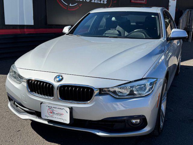 used 2018 BMW 330 car, priced at $19,995