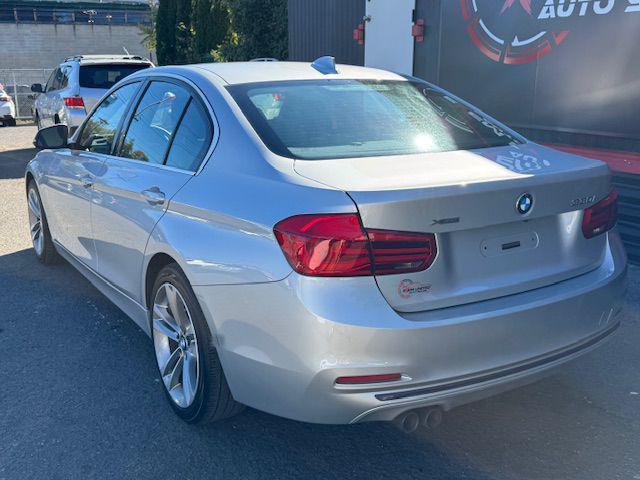 used 2018 BMW 330 car, priced at $19,995