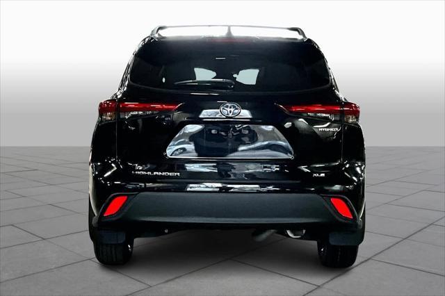 used 2021 Toyota Highlander Hybrid car, priced at $34,222