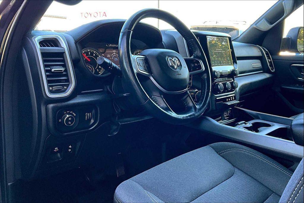 used 2021 Ram 1500 car, priced at $25,722