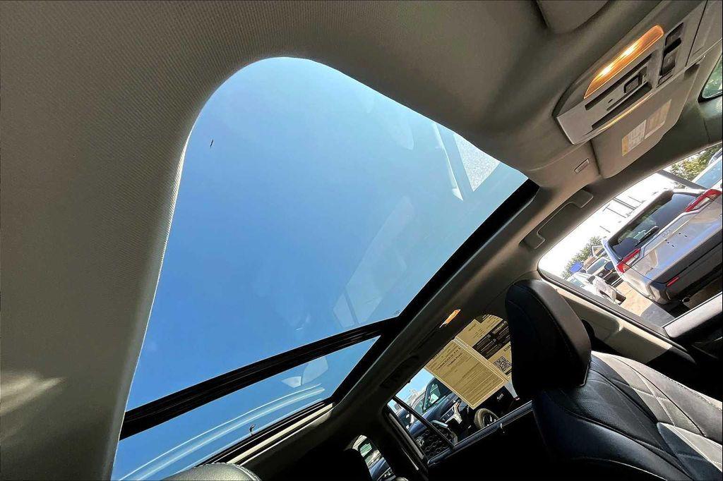 used 2024 Toyota Highlander Hybrid car, priced at $54,792