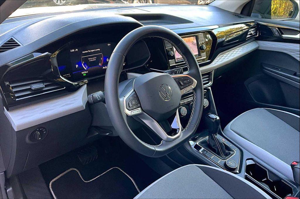 used 2023 Volkswagen Taos car, priced at $22,822