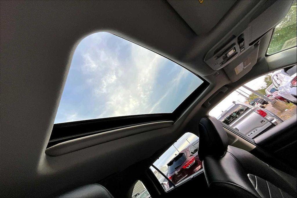 used 2020 Toyota Highlander Hybrid car, priced at $30,792