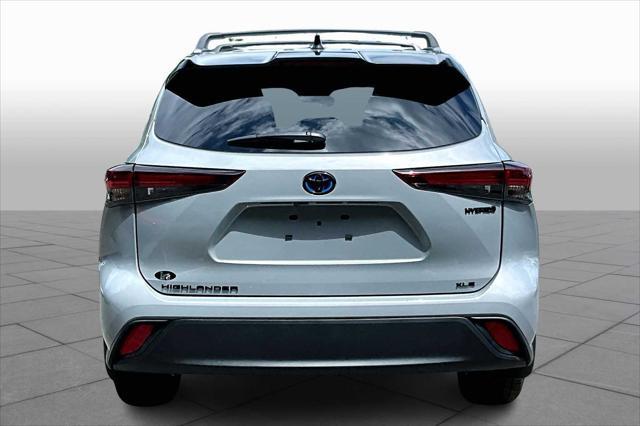 used 2024 Toyota Highlander Hybrid car, priced at $50,981