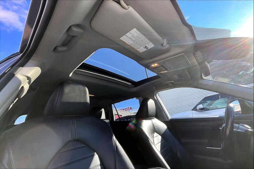 used 2022 Toyota Highlander Hybrid car, priced at $31,492