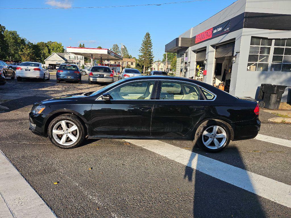 used 2015 Volkswagen Passat car, priced at $5,995