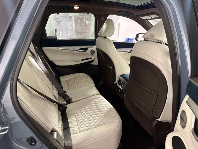 used 2024 INFINITI QX50 car, priced at $45,498
