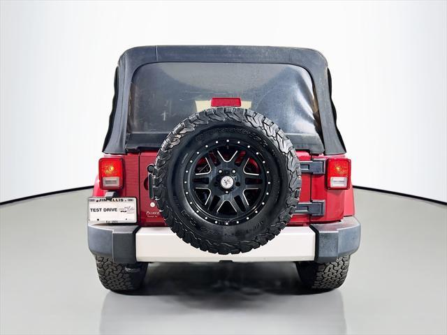 used 2013 Jeep Wrangler Unlimited car, priced at $13,265