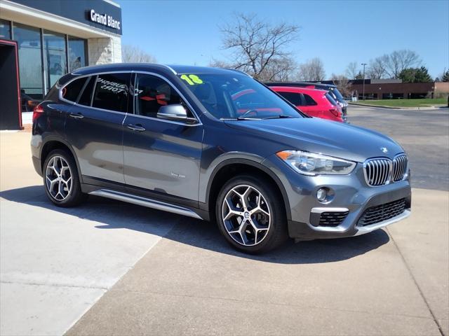 used 2018 BMW X1 car, priced at $14,500