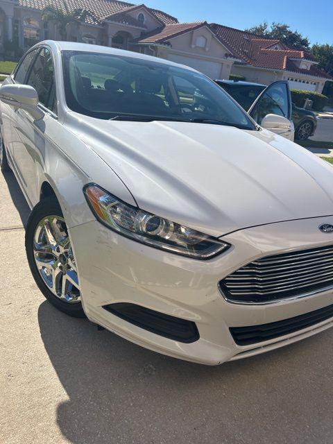 used 2015 Ford Fusion car, priced at $9,929