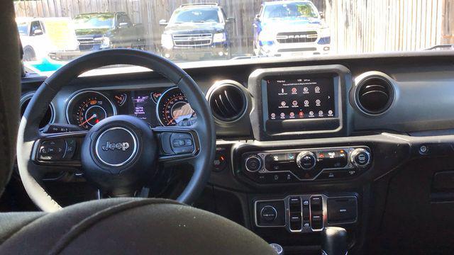 used 2023 Jeep Wrangler car, priced at $27,385