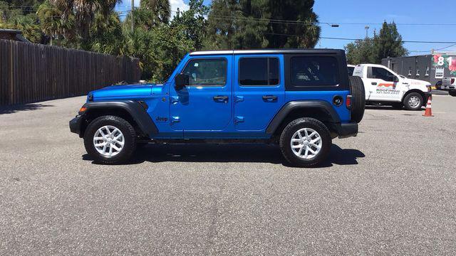 used 2023 Jeep Wrangler car, priced at $27,385