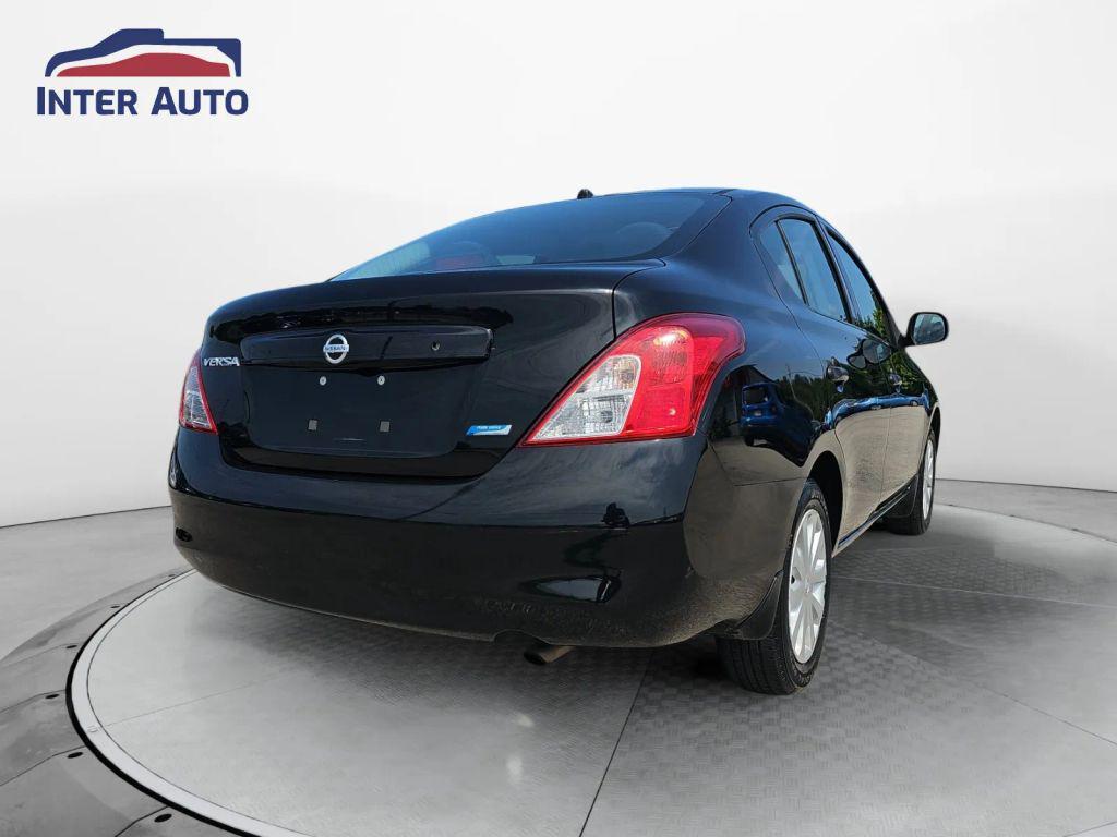 used 2013 Nissan Versa car, priced at $5,799