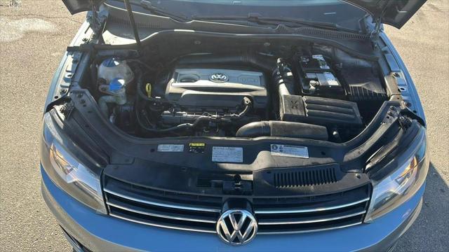 used 2014 Volkswagen Eos car, priced at $8,899